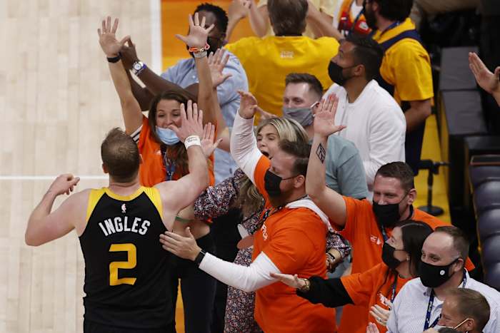 Joe Ingles (2) celebrates with fans during the Jazz 112-109 win over the Los Angeles Clippers